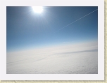 IMG_7285 * Above the cloud-deck with the sun and a contrail * Above the cloud-deck with the sun and a contrail * 3072 x 2304 * (1023KB)