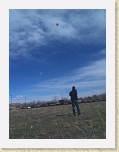 photo * Pat flying the kite with the camera dangling precariously on the line high above * Pat flying the kite with the camera dangling precariously on the line high above * 600 x 800 * (105KB)